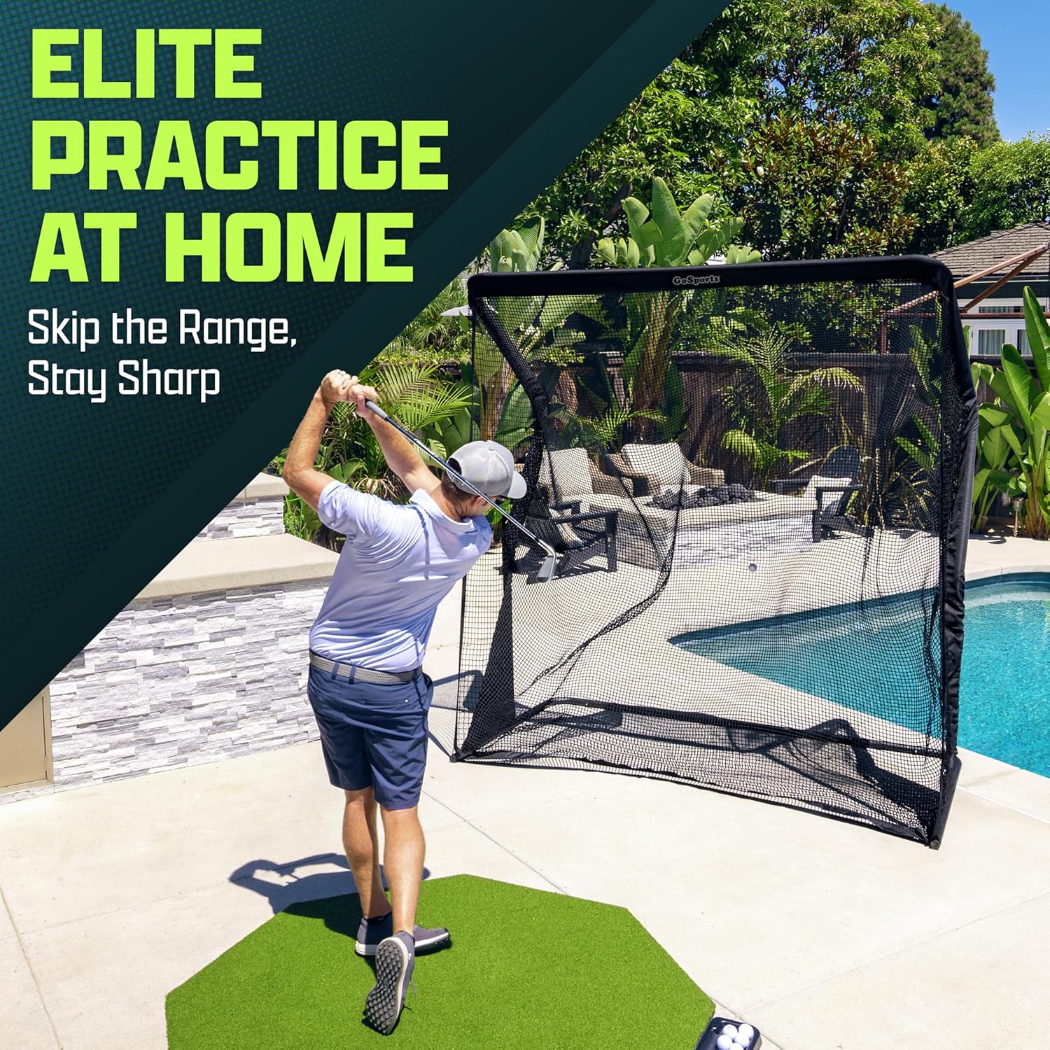 Person practicing golf swings in a home setting with a golf net and pool in the background.