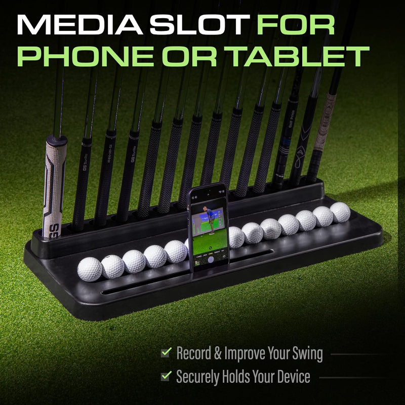Golf practice device with golf clubs, balls, and a phone on a green background