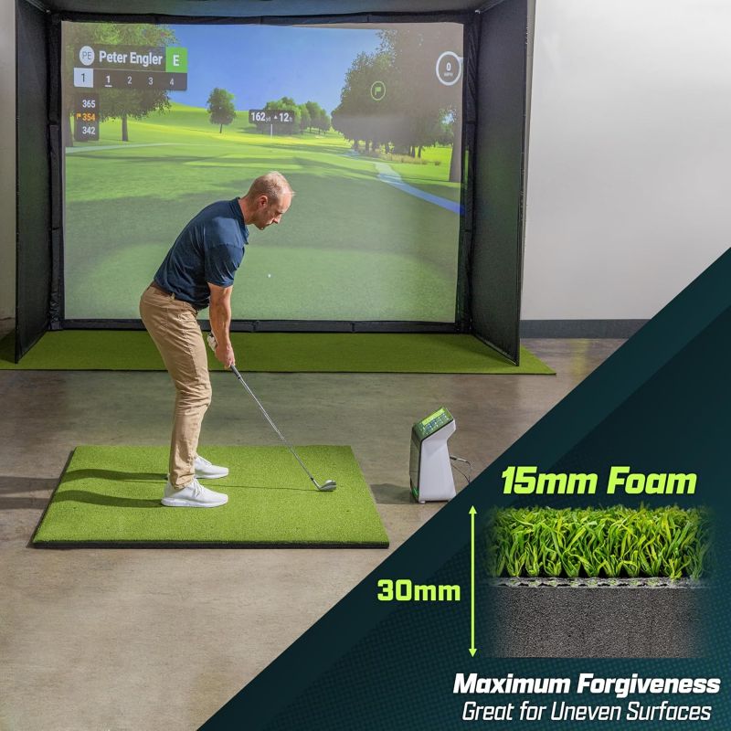 Man practicing golf swings in a simulator with a focus on the mat's thickness and foam quality.