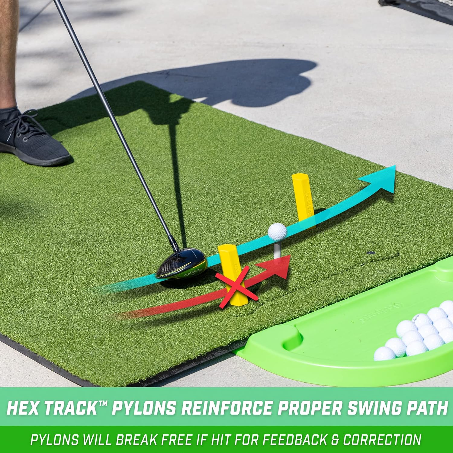 GoSports 5 ftx4 ft PRO Golf Practice Hitting Mat with hex track pylons and golf balls on a green mat.