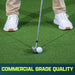 Golf club and ball on GoSports Golf Simulator Turf with 'Commercial Grade Quality' text.