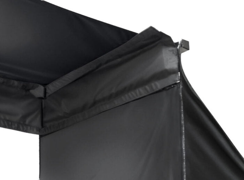 Close-up of a black softbox light modifier on a white background