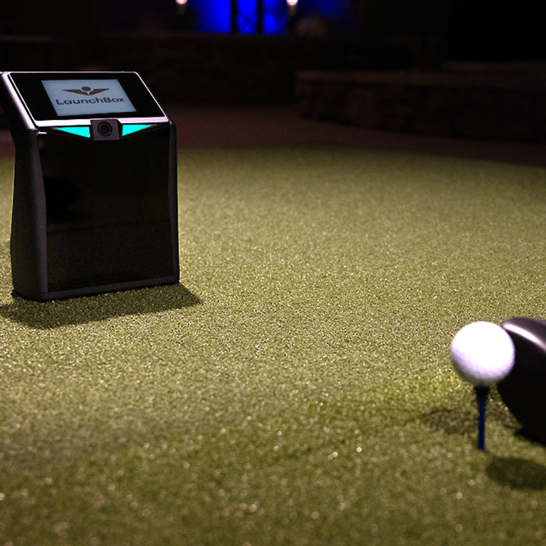 TruGolf LaunchBox being used indoors as golf simulator