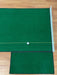Putting Green with a golf ball on a wooden floor