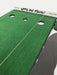 Green putting green mat with holes and 'Let's Do This!' text