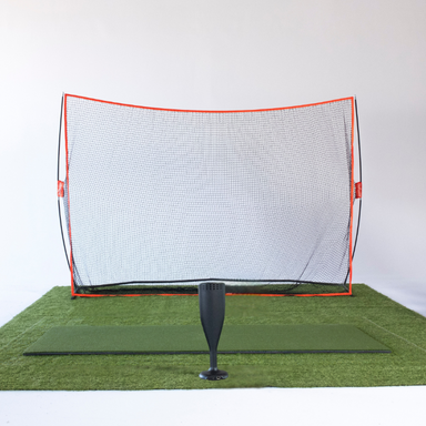 RSG ONE Golf simulator and practice net with a green mat on a white background