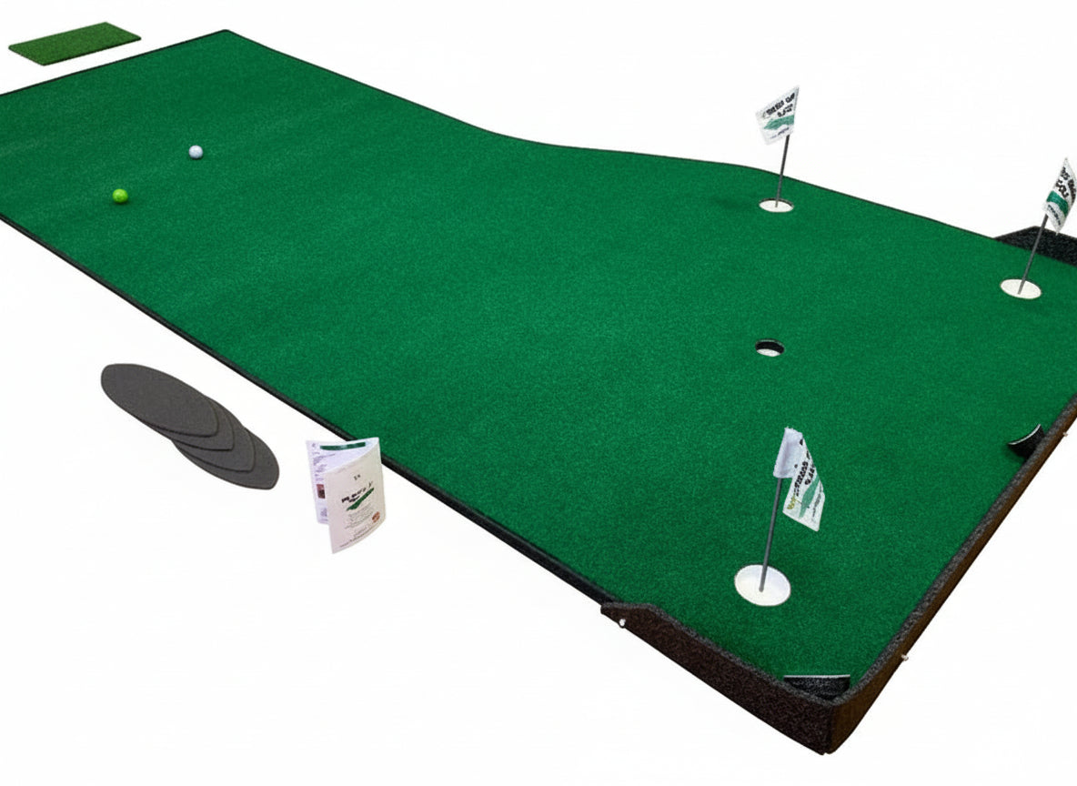 Green putting green mat with golf balls and flags on a wooden floor